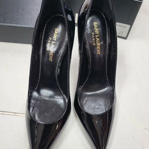 Yves Saint Laurent black patent pumps. Authentic. Sold As Is.